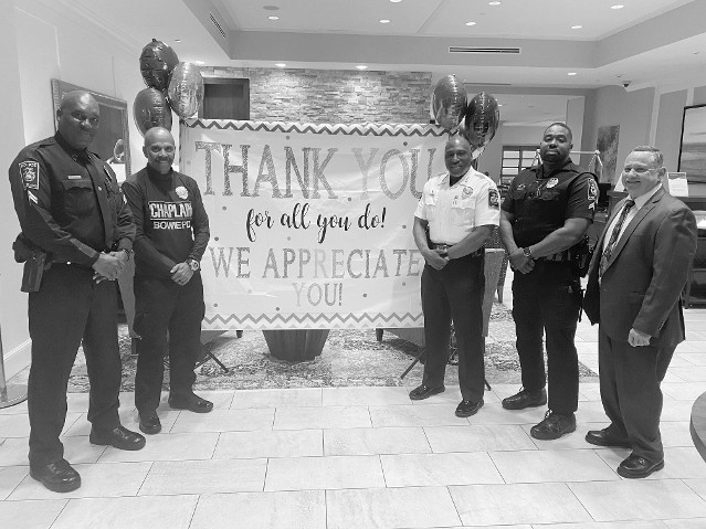 Members of the Bowie Police department at breakfast. From left to right: Cpl. Redmond, Chaplain Johnny Hodge, Chief Dwayne Preston, Cpl. Simms, and Captain Robert Liberati Jr.